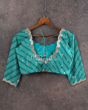 Blue Crepe Silk saree with digital kalamkari print and a beautiful mirror work border