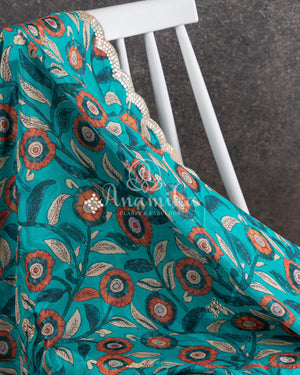 Blue Crepe Silk saree with digital kalamkari print and a beautiful mirror work border