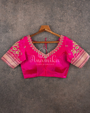 Sandstone Orange Kora Banarasi Tissue saree with a contrast pink blouse