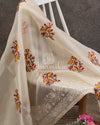Off white organza saree with a contrast pink work blouse