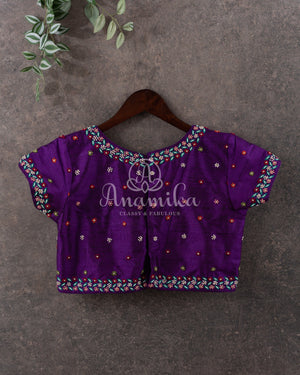 Cream Pure Munga Tusser saree with all over floral meenakari work, paired with a contrast purple blouse