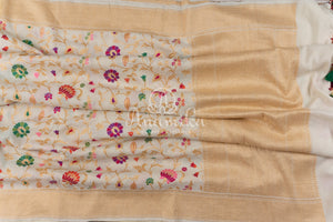 Cream Pure Munga Tusser saree with all over floral meenakari work, paired with a contrast purple blouse