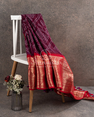 Maroon Wine Kanchi Bandini saree with a stunning red border