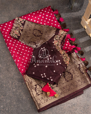 Pink Kanchi Bandini saree with a stunning brown border