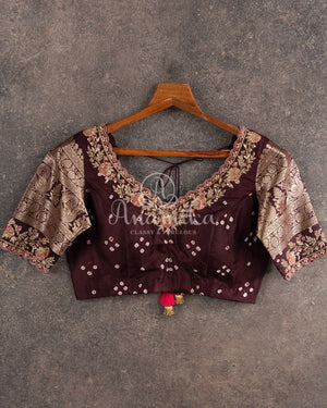 Pink Kanchi Bandini saree with a stunning brown border