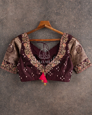 Pink Kanchi Bandini saree with a stunning brown border