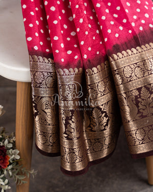 Pink Kanchi Bandini saree with a stunning brown border