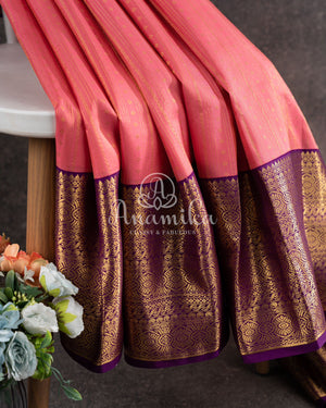 Lovely Peach Kanjeevaram saree with a contrast purple kanchi border