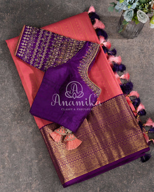 Lovely Peach Kanjeevaram saree with a contrast purple kanchi border