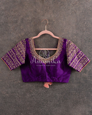 Lovely Peach Kanjeevaram saree with a contrast purple kanchi border