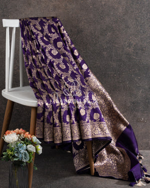 Purple Banarasi Silk Saree with an off white embroidered blouse