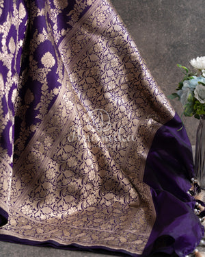 Purple Banarasi Silk Saree with an off white embroidered blouse