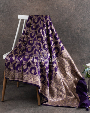Purple Banarasi Silk Saree with an off white embroidered blouse