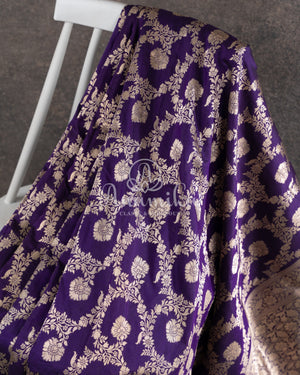 Purple Banarasi Silk Saree with an off white embroidered blouse