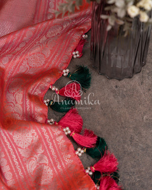 Dark Bottle Green Gadwal pattu saree with contrast peach pink blouse