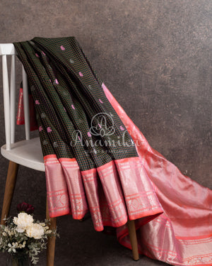 Dark Bottle Green Gadwal pattu saree with contrast peach pink blouse