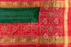 Pure Bandini Silk saree in bottle green with a contrast red patola border