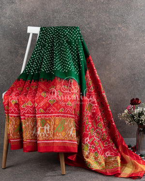 Pure Bandini Silk saree in bottle green with a contrast red patola border