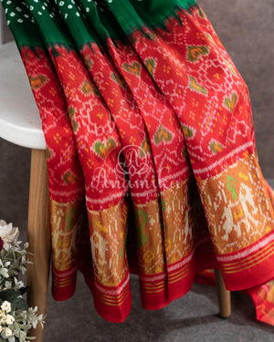 Pure Bandini Silk saree in bottle green with a contrast red patola border