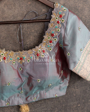 Teal Banarasi Silk Saree with a contrast hand work blouse