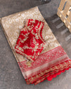 Stunning cream Banarasi Saree with red maggam work border