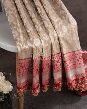 Stunning cream Banarasi Saree with red maggam work border