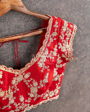 Stunning cream Banarasi Saree with red maggam work border