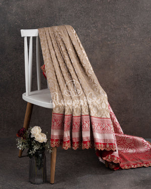 Stunning cream Banarasi Saree with red maggam work border