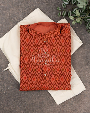 Ikkat Silk Kurta in a lively peach color with contemporary ikkat print
