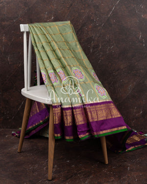 Pista Green Twill Kanchi saree with zari checks weaving