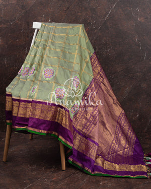 Pista Green Twill Kanchi saree with zari checks weaving
