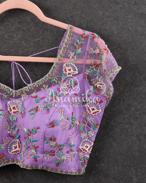 Lovely lavender blouse with net over lay and overall embroidery