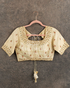 Cream color rawsilk blouse with gold and thread work