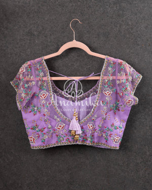 Lovely lavender blouse with net over lay and overall embroidery