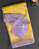 Yellow Banarasi Katan Tissue in Pastel Yellow with a stunning lavender zardosi work border