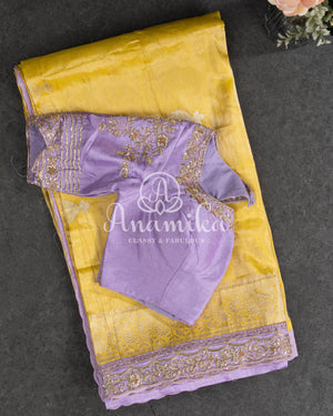 Yellow Banarasi Katan Tissue in Pastel Yellow with a stunning lavender zardosi work border