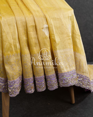 Yellow Banarasi Katan Tissue in Pastel Yellow with a stunning lavender zardosi work border