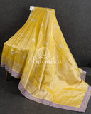 Yellow Banarasi Katan Tissue in Pastel Yellow with a stunning lavender zardosi work border