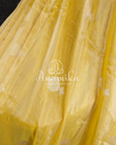 Yellow Banarasi Katan Tissue in Pastel Yellow with a stunning lavender zardosi work border