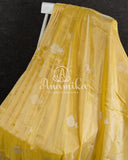 Yellow Banarasi Katan Tissue in Pastel Yellow with a stunning lavender zardosi work border