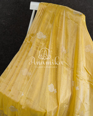 Yellow Banarasi Katan Tissue in Pastel Yellow with a stunning lavender zardosi work border