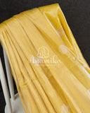 Yellow Banarasi Katan Tissue in Pastel Yellow with a stunning lavender zardosi work border