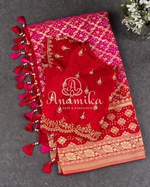 Pink/Red Bandini Georgette saree with a red off shoulder blouse