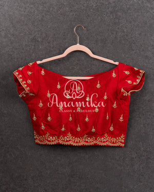 Pink/Red Bandini Georgette saree with a red off shoulder blouse