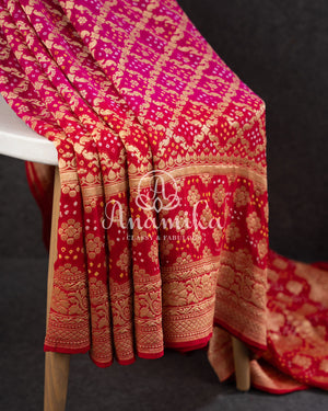 Pink/Red Bandini Georgette saree with a red off shoulder blouse