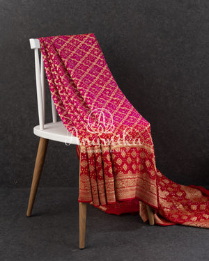 Pink/Red Bandini Georgette saree with a red off shoulder blouse