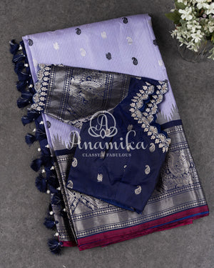 Lavender Gadwal Pattu saree with a contrast dark blue border and pallu
