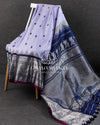 Lavender Gadwal Pattu saree with a contrast dark blue border and pallu