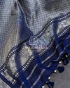 Lavender Gadwal Pattu saree with a contrast dark blue border and pallu