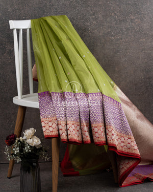Parrot Green Banarasi Kora saree with stunning red border